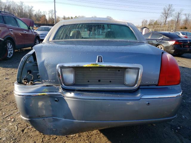 Photo 6 from auction – 2004 LINCOLN TOWN CAR E with VIN 1LNHM81W04Y687315