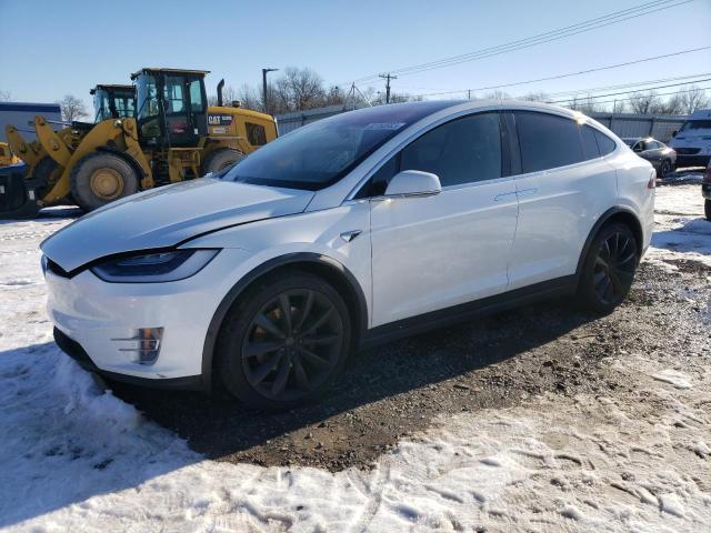 TESLA MODEL X 2018 with VIN 5YJXCBE21JF127791 - Photo from auction