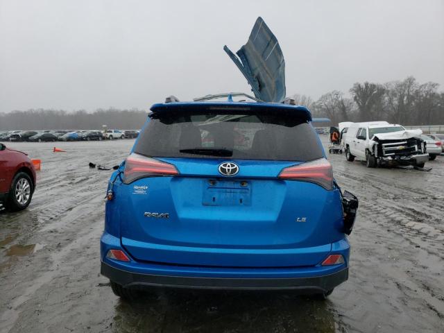 Photo 6 from auction – 2018 TOYOTA RAV4 LE with VIN JTMZFREV2JJ164358