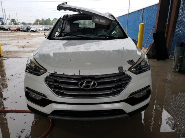 Photo 5 from auction – 2018 HYUNDAI SANTA FE S with VIN 5NMZU3LB8JH103226