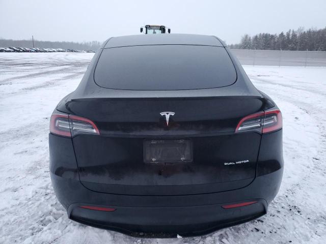 Photo 6 from auction – 2021 TESLA MODEL Y with VIN 5YJYGDEE4MF061840