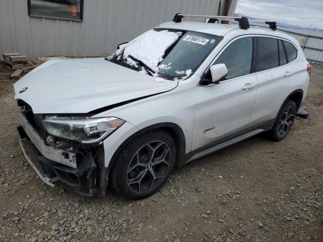 BMW X1 XDRIVE2 2018 with VIN WBXHT3C38J5F89617 - Photo from auction
