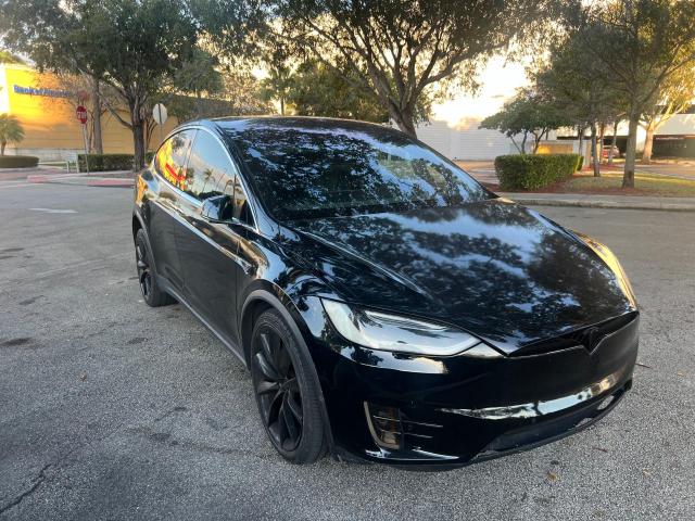 TESLA MODEL X 2016 with VIN 5YJXCAE4XGF002552 - Photo from auction