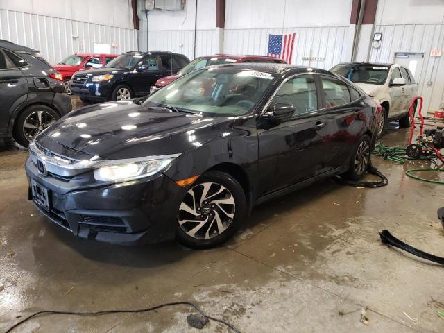 Photo 1 from auction – 2018 HONDA CIVIC EX with VIN 19XFC2F74JE039510