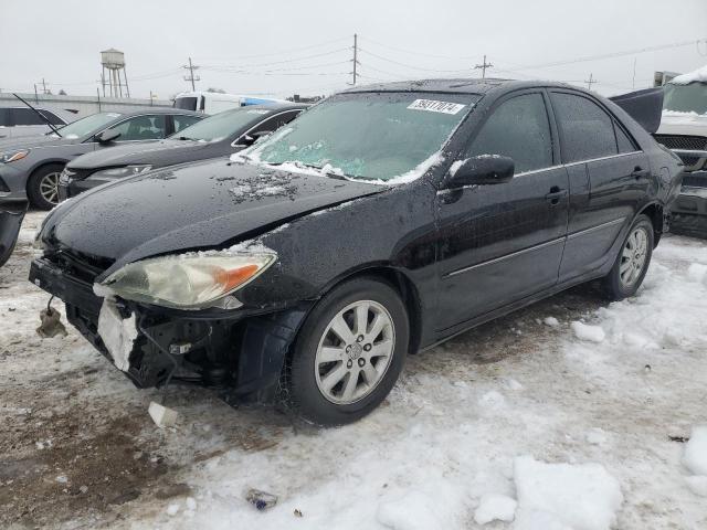 TOYOTA CAMRY 2002 with VIN JTDBF30K420057170 - Photo from auction