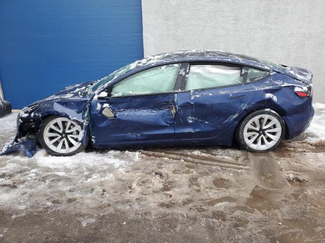 TESLA MODEL 3 2022 with VIN 5YJ3E1EA2NF372597 - Photo from auction