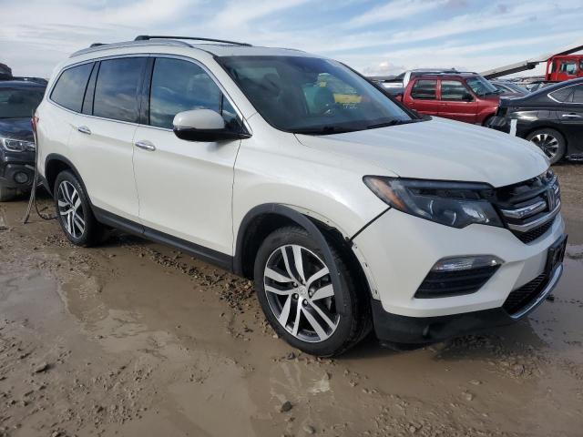 Photo 4 from auction – 2018 HONDA PILOT ELIT with VIN 5FNYF6H03JB054131