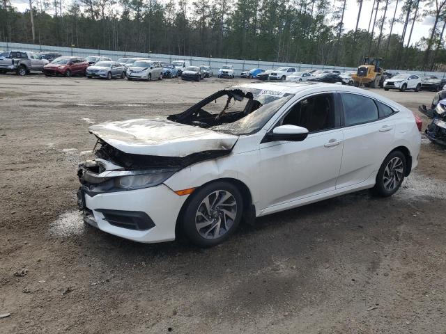 HONDA CIVIC EX 2017 with VIN 19XFC2F72HE066747 - Photo from auction