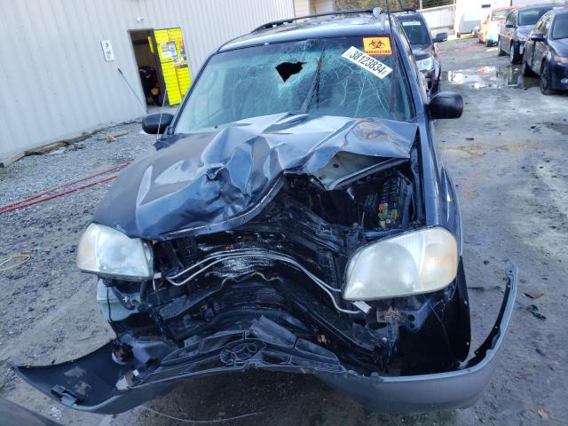 Photo 5 from auction – 2001 MAZDA TRIBUTE LX with VIN 4F2CU08121KM70485