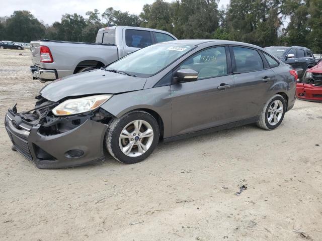 FORD FOCUS SE 2014 with VIN 1FADP3F23EL320027 - Photo from auction