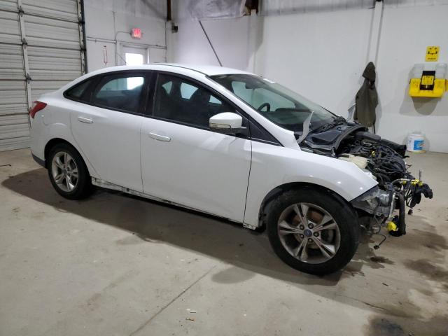 Photo 4 from auction – 2014 FORD FOCUS SE with VIN 1FADP3F29EL173860
