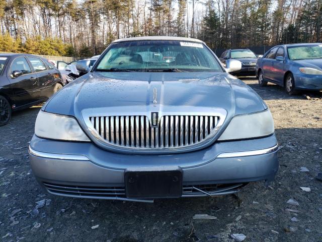 Photo 5 from auction – 2004 LINCOLN TOWN CAR E with VIN 1LNHM81W04Y687315