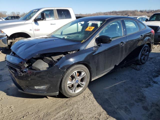 FORD FOCUS SE 2018 with VIN 1FADP3FE3JL269679 - Photo from auction