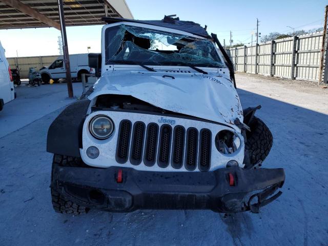 Photo 5 from auction – 2016 JEEP WRANGLER U with VIN 1C4BJWDG0GL119580