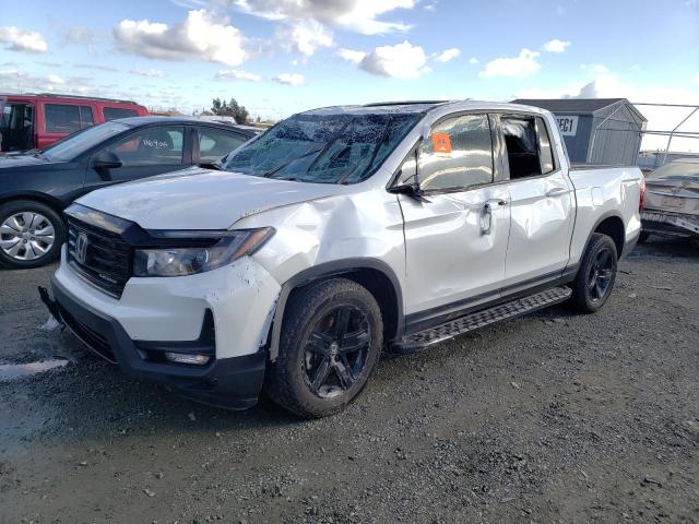 HONDA RIDGELINE 2023 with VIN 5FPYK3F80PB001356 - Photo from auction