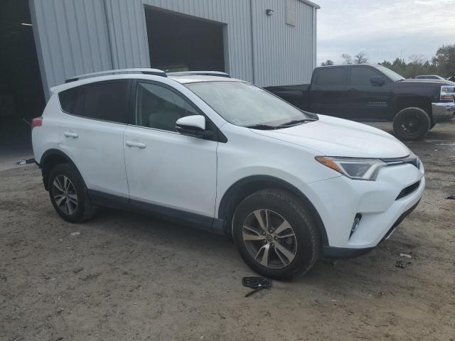 Photo 4 from auction – 2016 TOYOTA RAV4 XLE with VIN JTMWFREV8GJ072232