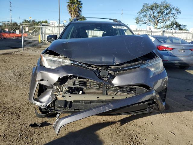 Photo 5 from auction – 2018 TOYOTA RAV4 LE with VIN 2T3ZFREV7JW415277