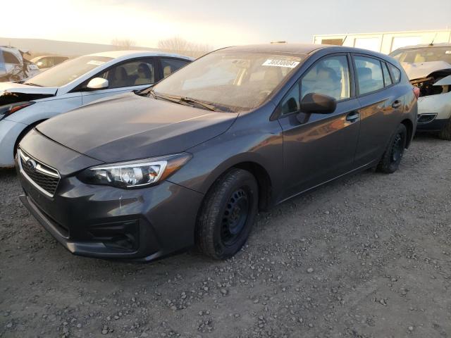 SUBARU IMPREZA 2019 with VIN 4S3GTAA61K3726594 - Photo from auction