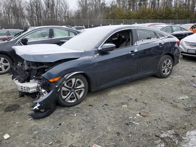 HONDA CIVIC EX 2018 with VIN JHMFC1F37JX030869 - Photo from auction