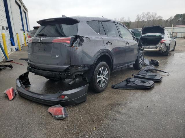 Photo 3 from auction – 2018 TOYOTA RAV4 LE with VIN JTMZFREV2JJ211176