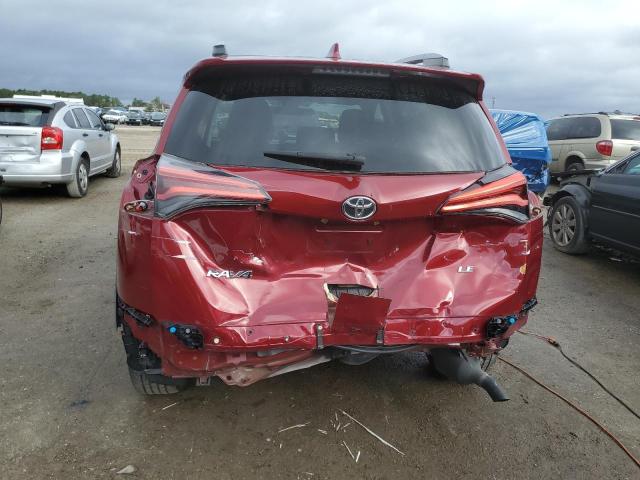 Photo 6 from auction – 2018 TOYOTA RAV4 LE with VIN 2T3ZFREV9JW473617