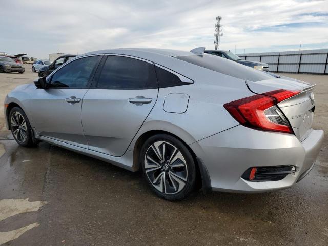 Photo 2 from auction – 2018 HONDA CIVIC EX with VIN 19XFC1F32JE201433