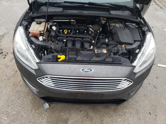 Photo 11 from auction – 2015 FORD FOCUS TITA with VIN 1FADP3J2XFL338002