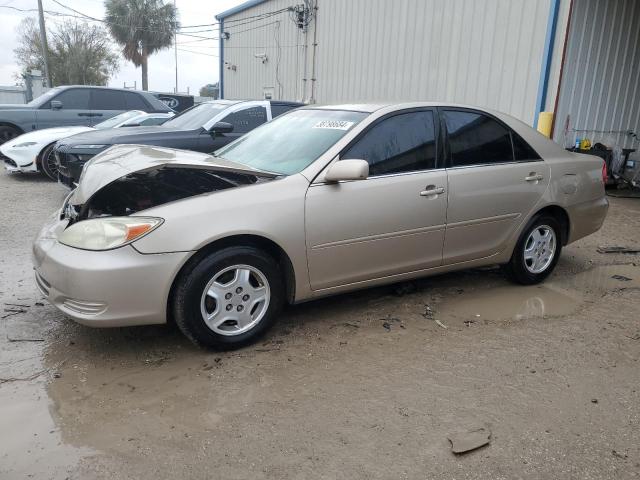 TOYOTA CAMRY LE 2003 with VIN 4T1BF30K63U061842 - Photo from auction