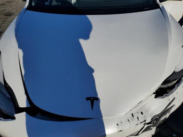 Photo 11 from auction – 2021 TESLA MODEL 3 with VIN 5YJ3E1EB9MF060963