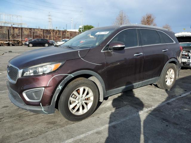 KIA SORENTO LX 2016 with VIN 5XYPG4A37GG051848 - Photo from auction