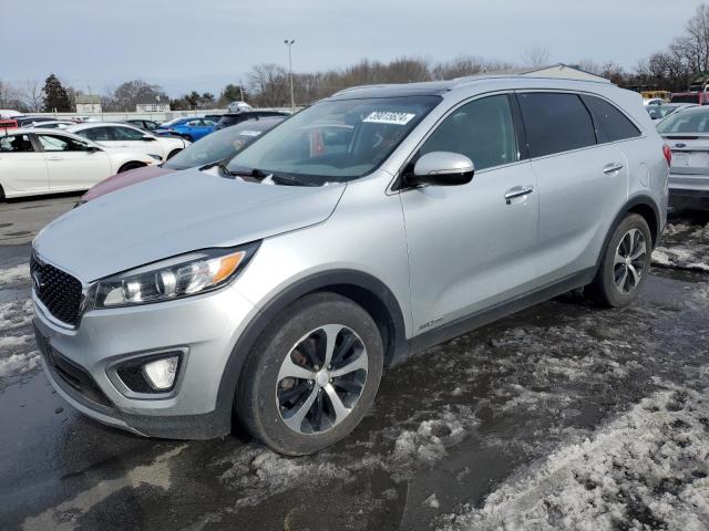 KIA SORENTO EX 2016 with VIN 5XYPHDA51GG077571 - Photo from auction