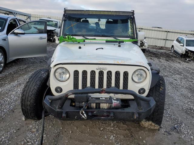 Photo 5 from auction – 2015 JEEP WRANGLER U with VIN 1C4BJWDG8FL762368