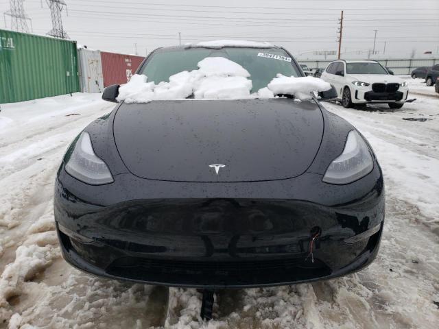 Photo 5 from auction – 2023 TESLA MODEL Y with VIN 7SAYGAEE3PF668673