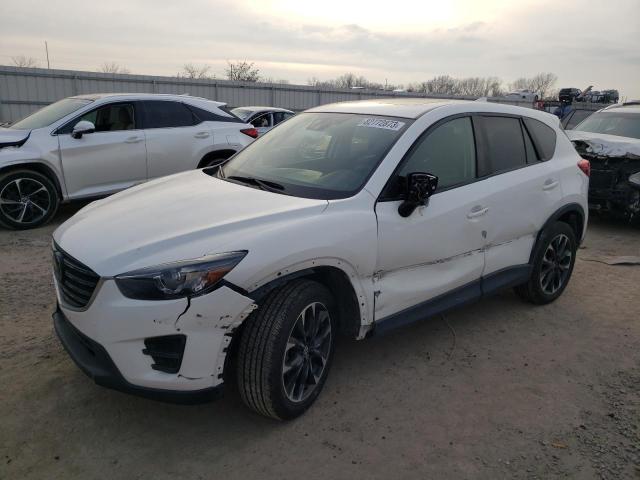 MAZDA CX-5 GT 2016 with VIN JM3KE4DY3G0898886 - Photo from auction