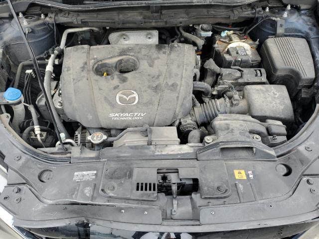 Photo 11 from auction – 2014 MAZDA CX-5 GT with VIN JM3KE2DY5E0396057