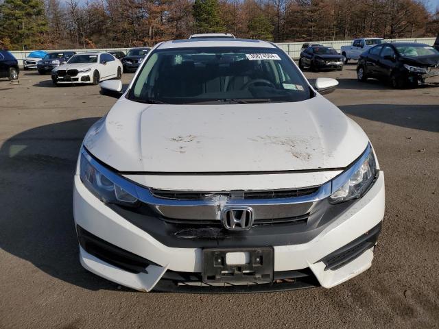 Photo 5 from auction – 2018 HONDA CIVIC EX with VIN 19XFC2F74JE208540