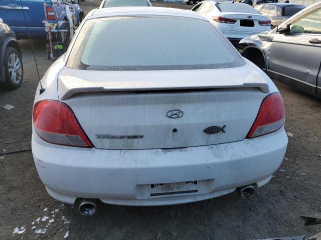 Photo 6 from auction – 2005 HYUNDAI TIBURON with VIN KMHHM65D85U164100