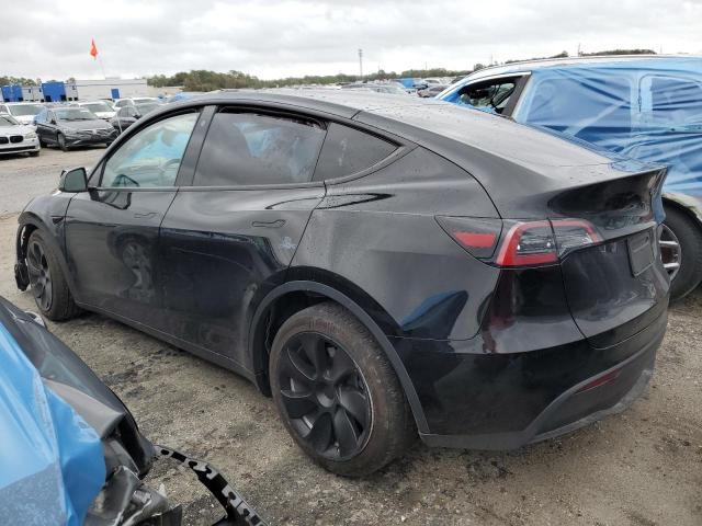 Photo 2 from auction – 2023 TESLA MODEL Y with VIN 7SAYGDEE1PA087123