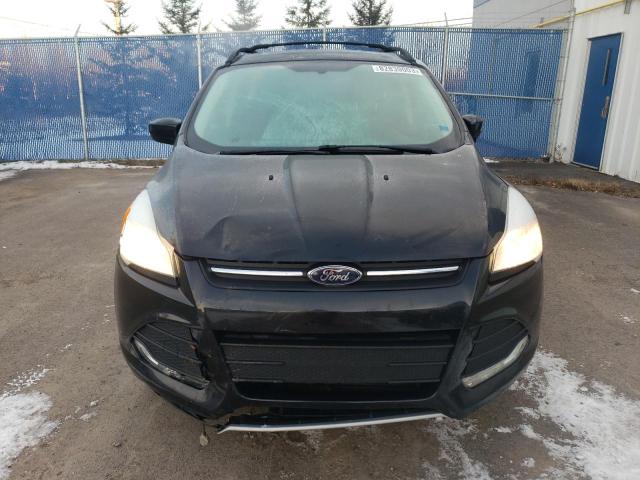Photo 5 from auction – 2015 FORD ESCAPE SE with VIN 1FMCU9G99FUC38517