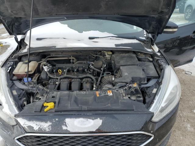 Photo 11 from auction – 2016 FORD FOCUS SE with VIN 1FADP3F26GL289004