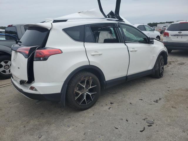 Photo 3 from auction – 2016 TOYOTA RAV4 SE with VIN JTMNFREV7GJ089471