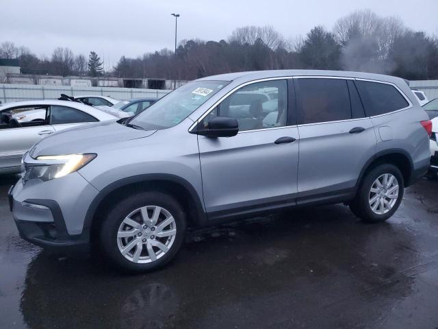HONDA PILOT LX 2020 with VIN 5FNYF6H12LB007233 - Photo from auction