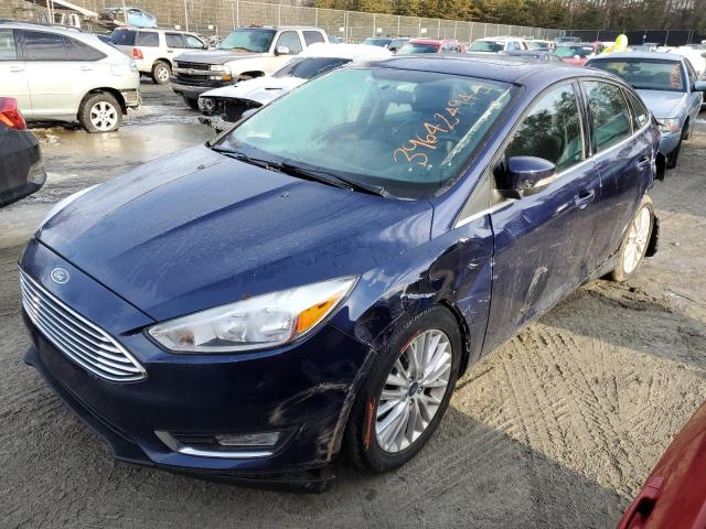 FORD FOCUS TITA 2017 with VIN 1FADP3J22HL338580 - Photo from auction
