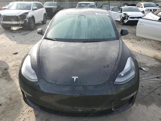 Photo 5 from auction – 2021 TESLA MODEL 3 with VIN 5YJ3E1EB5MF975342