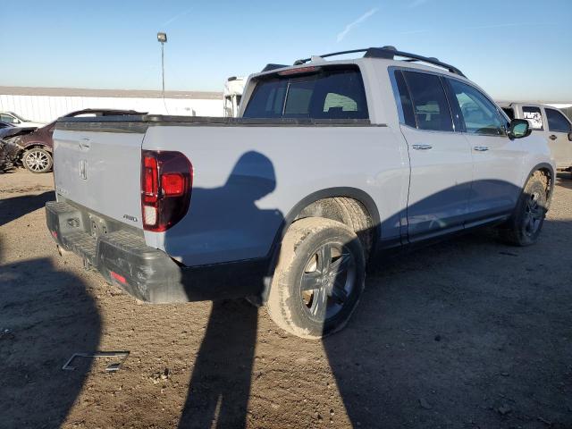 Photo 3 from auction – 2022 HONDA RIDGELINE with VIN 5FPYK3F78NB018457