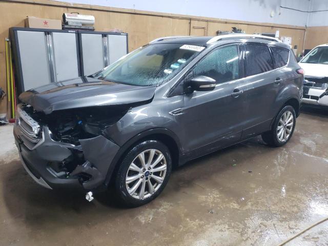 FORD ESCAPE TIT 2017 with VIN 1FMCU9J97HUB75476 - Photo from auction