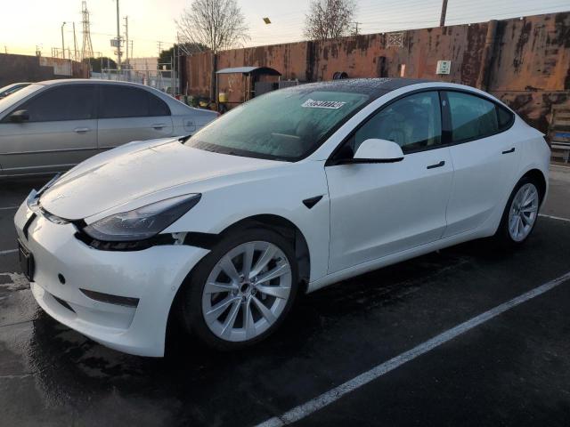 TESLA MODEL 3 2022 with VIN 5YJ3E1EA4NF143273 - Photo from auction