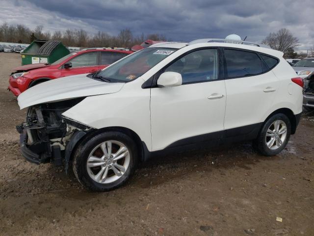 HYUNDAI TUCSON GLS 2011 with VIN KM8JUCAC5BU190453 - Photo from auction