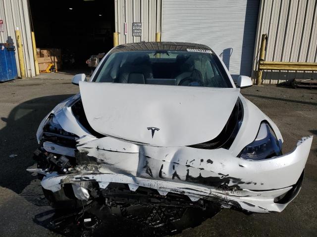 Photo 5 from auction – 2022 TESLA MODEL 3 with VIN 5YJ3E1EB4NF144187