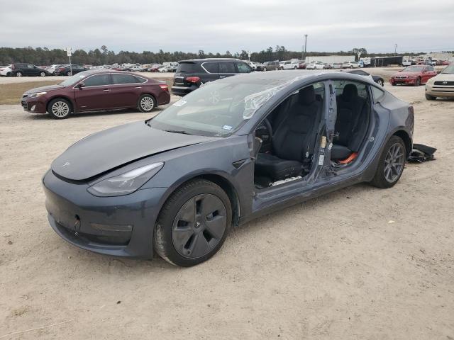 TESLA MODEL 3 2022 with VIN 5YJ3E1EB9NF340142 - Photo from auction